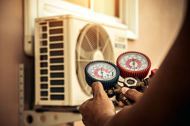 Professional Ductwork Repair technician working in Dayville, CT